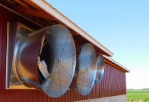 Does negative pressure created by exhaust fans affect poultry?